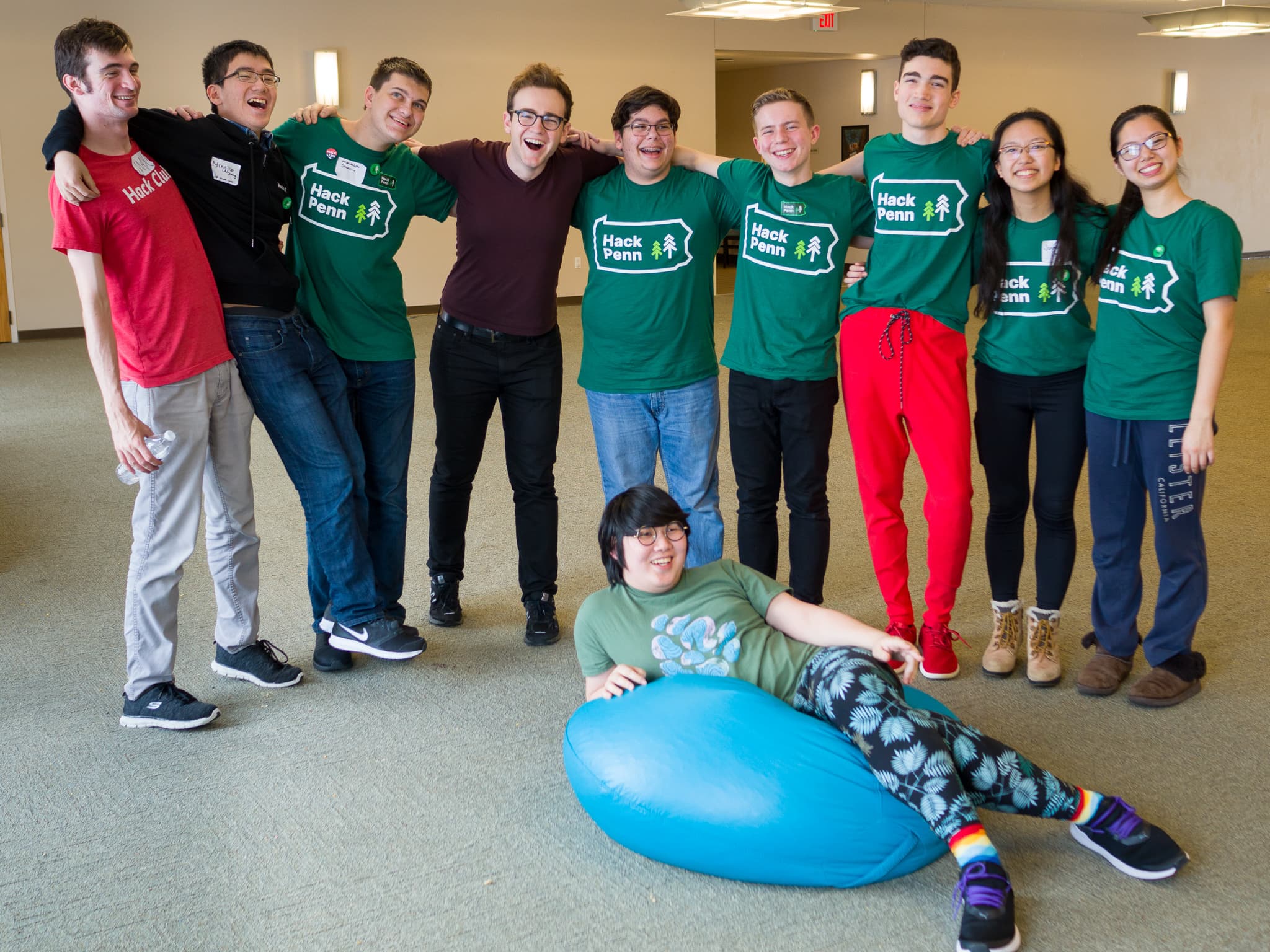 Organizing & mentorship team from Hack Penn hugging after the event